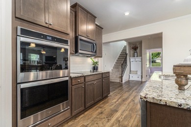 This beautifully upgraded 4-bedroom, 3-bathroom ranch-style home on The Highlands Course at Lake Arrowhead in Georgia - for sale on GolfHomes.com, golf home, golf lot