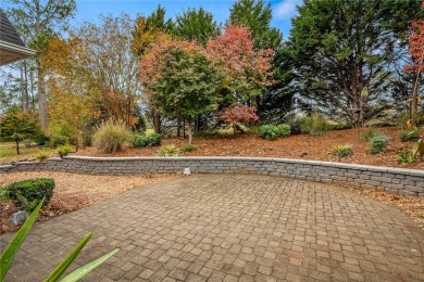 Quality craftsmanship in this one level brick home perfectly on Cobbs Glen Country Club in South Carolina - for sale on GolfHomes.com, golf home, golf lot