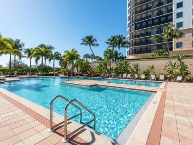 Experience refined coastal living in this elegant residence at on Hammock Bay in Florida - for sale on GolfHomes.com, golf home, golf lot