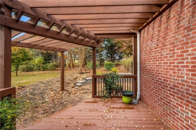 Quality craftsmanship in this one level brick home perfectly on Cobbs Glen Country Club in South Carolina - for sale on GolfHomes.com, golf home, golf lot