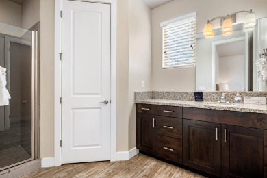 This stunning home is located in the highly sought-after on Entrada at Snow Canyon in Utah - for sale on GolfHomes.com, golf home, golf lot