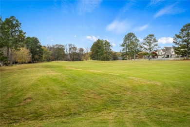 Quality craftsmanship in this one level brick home perfectly on Cobbs Glen Country Club in South Carolina - for sale on GolfHomes.com, golf home, golf lot