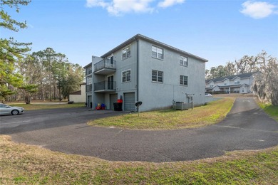Motivated Seller! Spacious 2BR/2BA Condo with Garage & Scenic on Meadowbrook Golf Club in Florida - for sale on GolfHomes.com, golf home, golf lot