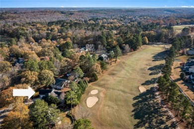 Quality craftsmanship in this one level brick home perfectly on Cobbs Glen Country Club in South Carolina - for sale on GolfHomes.com, golf home, golf lot