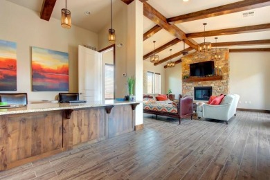 This stunning home is located in the highly sought-after on Entrada at Snow Canyon in Utah - for sale on GolfHomes.com, golf home, golf lot