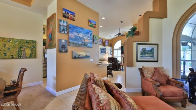 Discover the Florida lifestyle in this pool home-offered on Plantation Bay Golf and Country Club in Florida - for sale on GolfHomes.com, golf home, golf lot
