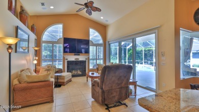 Discover the Florida lifestyle in this pool home-offered on Plantation Bay Golf and Country Club in Florida - for sale on GolfHomes.com, golf home, golf lot