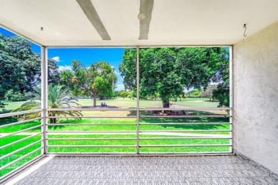Enjoy peaceful golf course views from your screened patio at on Colony West Country Club in Florida - for sale on GolfHomes.com, golf home, golf lot