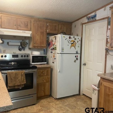 Affordable Mobile Home in Gated Community with Access to Lake on Links At Lands End in Texas - for sale on GolfHomes.com, golf home, golf lot