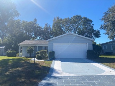 Outstanding one-story home with a screened porch and a beautiful on Plantation Golf Club in Florida - for sale on GolfHomes.com, golf home, golf lot