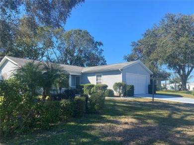 Outstanding one-story home with a screened porch and a beautiful on Plantation Golf Club in Florida - for sale on GolfHomes.com, golf home, golf lot