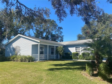 Outstanding one-story home with a screened porch and a beautiful on Plantation Golf Club in Florida - for sale on GolfHomes.com, golf home, golf lot