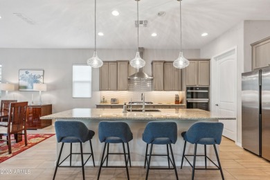 Located in the newer Mountain Side of Sun City Festival, this on Copper Canyon Golf Club in Arizona - for sale on GolfHomes.com, golf home, golf lot