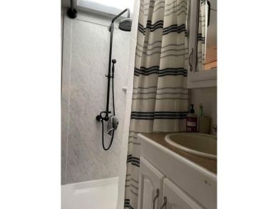 Fantastic 2006 5th wheel with an attached Durabilt sunroom for on Avalon Golf Club in New Jersey - for sale on GolfHomes.com, golf home, golf lot