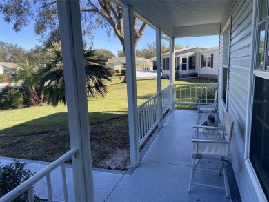 Outstanding one-story home with a screened porch and a beautiful on Plantation Golf Club in Florida - for sale on GolfHomes.com, golf home, golf lot