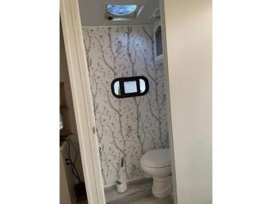 Fantastic 2006 5th wheel with an attached Durabilt sunroom for on Avalon Golf Club in New Jersey - for sale on GolfHomes.com, golf home, golf lot