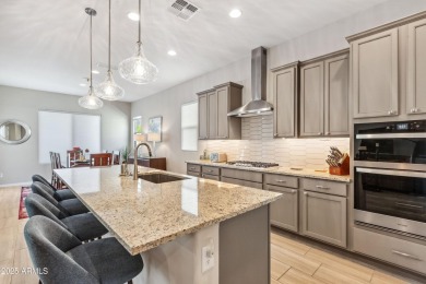 Located in the newer Mountain Side of Sun City Festival, this on Copper Canyon Golf Club in Arizona - for sale on GolfHomes.com, golf home, golf lot
