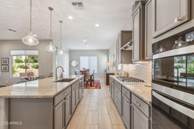 Located in the newer Mountain Side of Sun City Festival, this on Copper Canyon Golf Club in Arizona - for sale on GolfHomes.com, golf home, golf lot