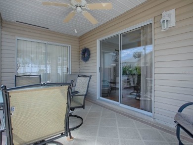 Charming 3-Bedroom BONITA model Courtyard Villa in The Village on Truman Executive Golf Course in Florida - for sale on GolfHomes.com, golf home, golf lot