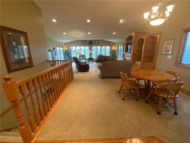 Welcome to this stunning, move-in-ready home located on the 14th on River Oaks Golf Club in Minnesota - for sale on GolfHomes.com, golf home, golf lot