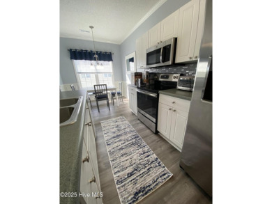 Must see! Fully furnished condo located in the Resort style on Magnolia Greens Golf Plantation in North Carolina - for sale on GolfHomes.com, golf home, golf lot