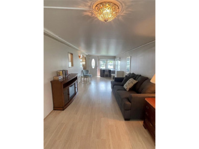 RETIRE WITH CONFIDENCE. HOA is LOW and includes on Cypress Point RV Golf Club in Florida - for sale on GolfHomes.com, golf home, golf lot