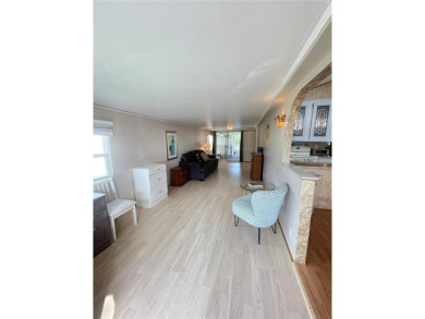 RETIRE WITH CONFIDENCE. HOA is LOW and includes on Cypress Point RV Golf Club in Florida - for sale on GolfHomes.com, golf home, golf lot