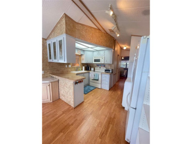 RETIRE WITH CONFIDENCE. HOA is LOW and includes on Cypress Point RV Golf Club in Florida - for sale on GolfHomes.com, golf home, golf lot