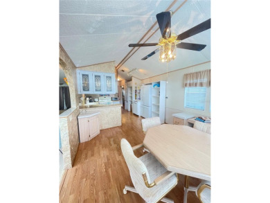 RETIRE WITH CONFIDENCE. HOA is LOW and includes on Cypress Point RV Golf Club in Florida - for sale on GolfHomes.com, golf home, golf lot