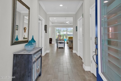Tropical-inspired Coconut model single-family pool & spa home on LPGA International Golf Course in Florida - for sale on GolfHomes.com, golf home, golf lot