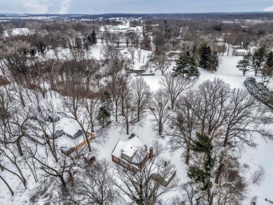 Charming Bluffside Retreat with Panoramic River Valley Views

 on Emerald Greens Golf Course in Missouri - for sale on GolfHomes.com, golf home, golf lot