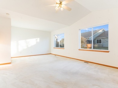 Sprawling ranch townhome with stunning pond views in the sought on The Links at Carillon in Illinois - for sale on GolfHomes.com, golf home, golf lot