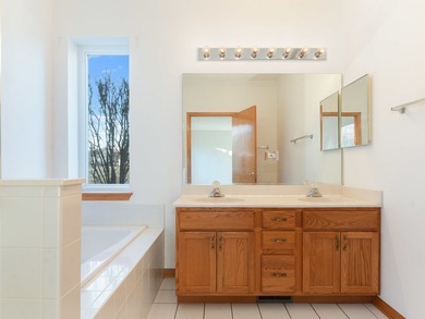 Sprawling ranch townhome with stunning pond views in the sought on The Links at Carillon in Illinois - for sale on GolfHomes.com, golf home, golf lot