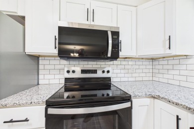 Discover this beautifully remodeled home just one minute from on Big Creek Golf and Country Club in Arkansas - for sale on GolfHomes.com, golf home, golf lot
