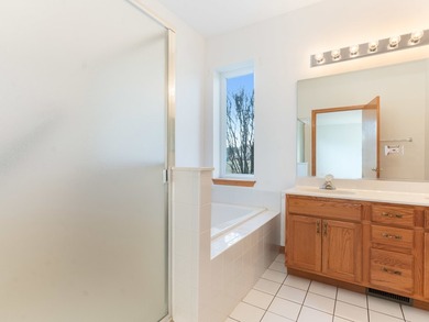 Sprawling ranch townhome with stunning pond views in the sought on The Links at Carillon in Illinois - for sale on GolfHomes.com, golf home, golf lot