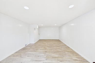 Discover this beautifully remodeled home just one minute from on Big Creek Golf and Country Club in Arkansas - for sale on GolfHomes.com, golf home, golf lot