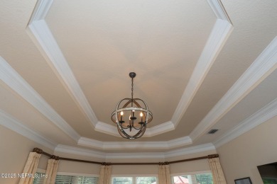 Stunning, light-filled home in JGCC on a private lot with on Jacksonville Golf and Country Club in Florida - for sale on GolfHomes.com, golf home, golf lot