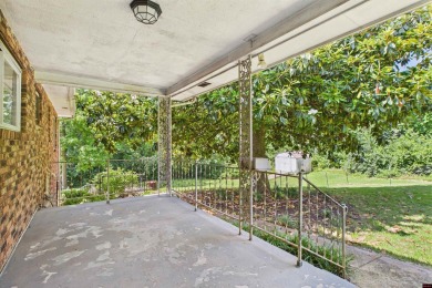 Discover this beautifully remodeled home just one minute from on Big Creek Golf and Country Club in Arkansas - for sale on GolfHomes.com, golf home, golf lot