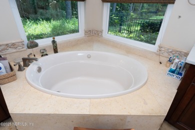 Stunning, light-filled home in JGCC on a private lot with on Jacksonville Golf and Country Club in Florida - for sale on GolfHomes.com, golf home, golf lot
