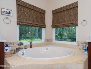 Stunning, light-filled home in JGCC on a private lot with on Jacksonville Golf and Country Club in Florida - for sale on GolfHomes.com, golf home, golf lot