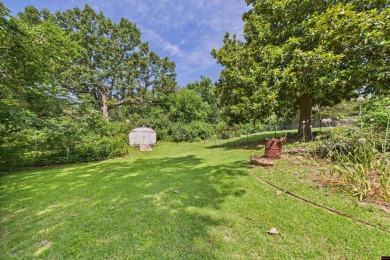 Discover this beautifully remodeled home just one minute from on Big Creek Golf and Country Club in Arkansas - for sale on GolfHomes.com, golf home, golf lot