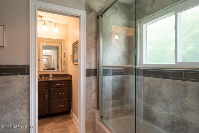 Stunning, light-filled home in JGCC on a private lot with on Jacksonville Golf and Country Club in Florida - for sale on GolfHomes.com, golf home, golf lot