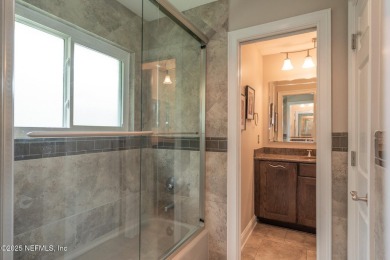 Stunning, light-filled home in JGCC on a private lot with on Jacksonville Golf and Country Club in Florida - for sale on GolfHomes.com, golf home, golf lot