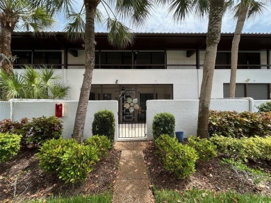 Welcome to your slice of paradise in this first-floor 2-bedroom on IMG Academies Golf and Country Club in Florida - for sale on GolfHomes.com, golf home, golf lot