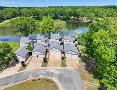 Discover your dream home that boasts breathtaking lake and golf on Diamondhead Golf and Country Club in Arkansas - for sale on GolfHomes.com, golf home, golf lot