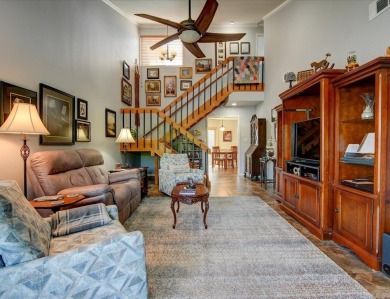 Discover your dream home that boasts breathtaking lake and golf on Diamondhead Golf and Country Club in Arkansas - for sale on GolfHomes.com, golf home, golf lot