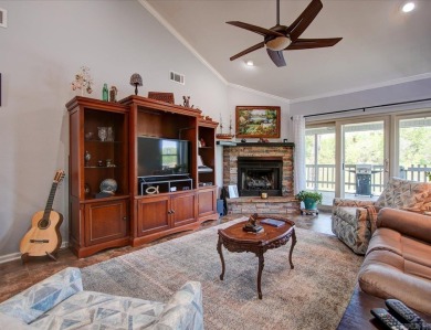Discover your dream home that boasts breathtaking lake and golf on Diamondhead Golf and Country Club in Arkansas - for sale on GolfHomes.com, golf home, golf lot