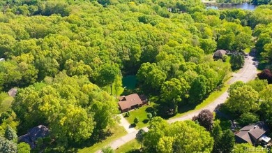 Immaculate one-owner home on 2.75 Acres with a delightful on Shepherds Hollow Golf Club in Michigan - for sale on GolfHomes.com, golf home, golf lot