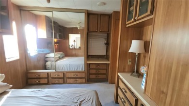 DOUBLE WIDE MOBILE HOME in active 55+ community. FIXER-UPPER IS on River Run Golf Links in Florida - for sale on GolfHomes.com, golf home, golf lot