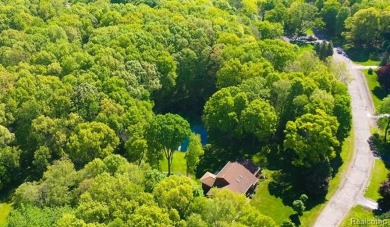 Immaculate one-owner home on 2.75 Acres with a delightful on Shepherds Hollow Golf Club in Michigan - for sale on GolfHomes.com, golf home, golf lot